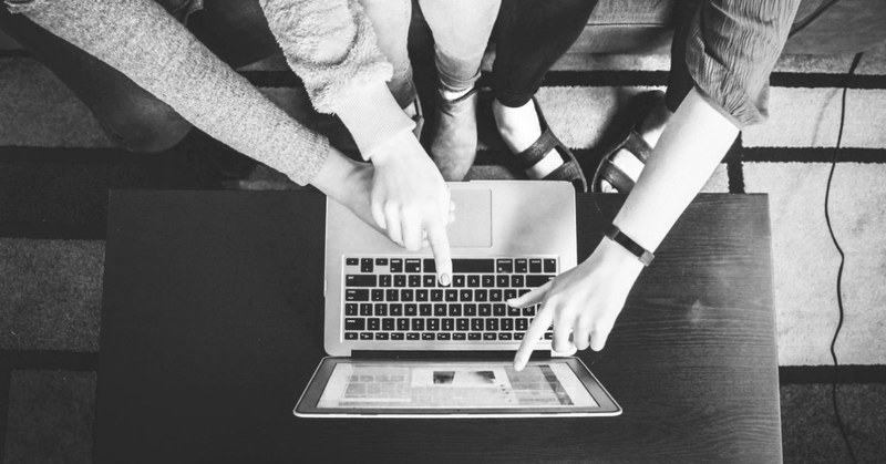 A group of people point their fingers at a laptop screen. Click here to go to Measure 1 - Digital Teaching Literacy